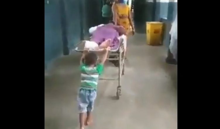 Ward Boy was removed after pulling a 6 year-old's stretcher in UP